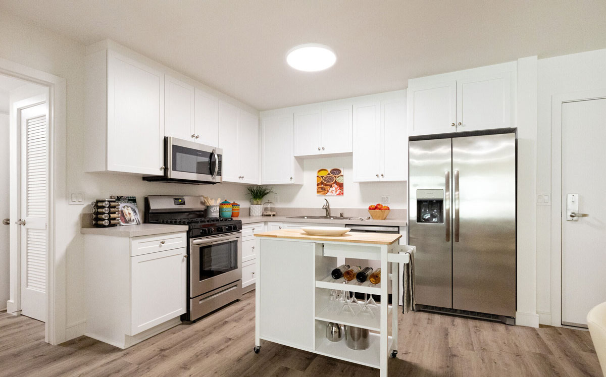 Picture of kitchen of furnished unit.